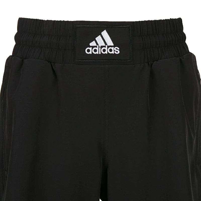 Black shorts with Adidas logo and full-length inner lining.