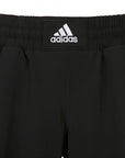 Black shorts with Adidas logo and full-length inner lining.