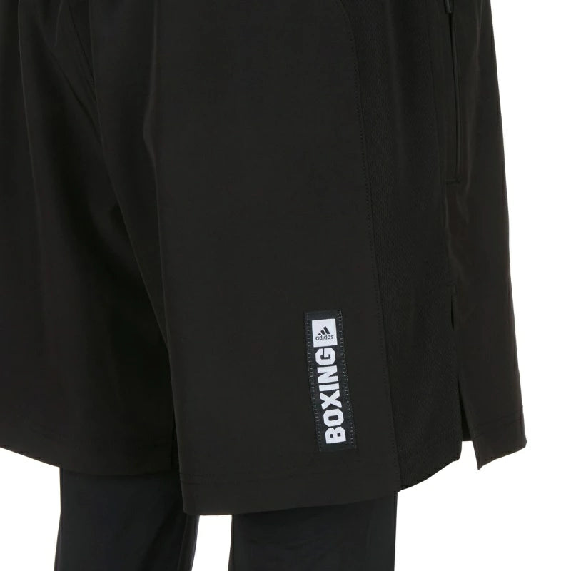 Close-up of black Adidas Boxwear Tech shorts with full-length inner lining.