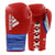 Pair of red adidas boxing gloves.