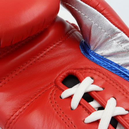 Close up of a red boxing glove.