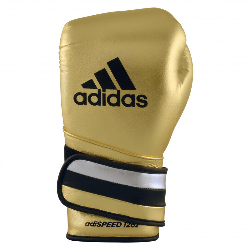 Gold boxing glove with black and white stripes for boxing or kickboxing.