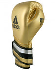 Gold boxing glove with black stripes for boxing or kickboxing.