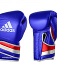 Pair of adidas Adi-Speed 501 boxing gloves in Met Gold/Red/Silver, 10 oz weight.