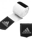 Pair of adidas white and black boxing hand wraps.