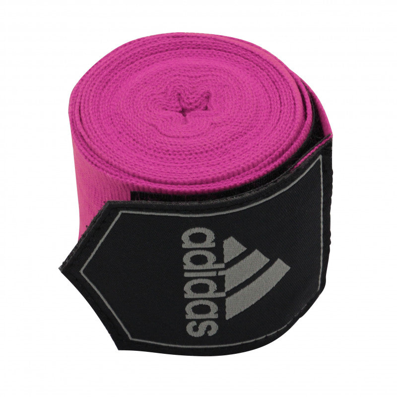 Pink and black bandage for boxing protection.