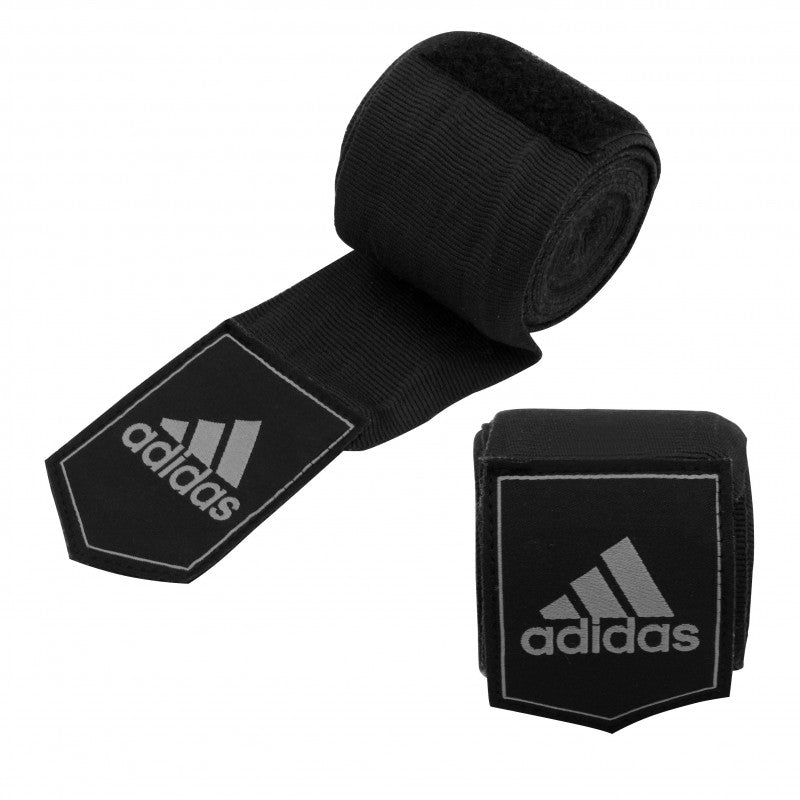 A pair of black wrist wraps for boxing.