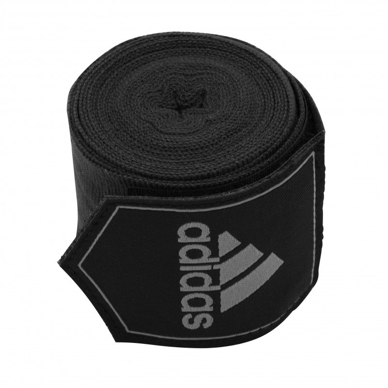 Roll of black fabric, used as boxing hand wraps.