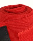 Red roll of IBA-approved adidas boxing hand wrap.