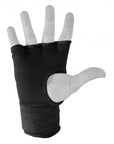 Hand wearing black glove for adidas inner gloves.