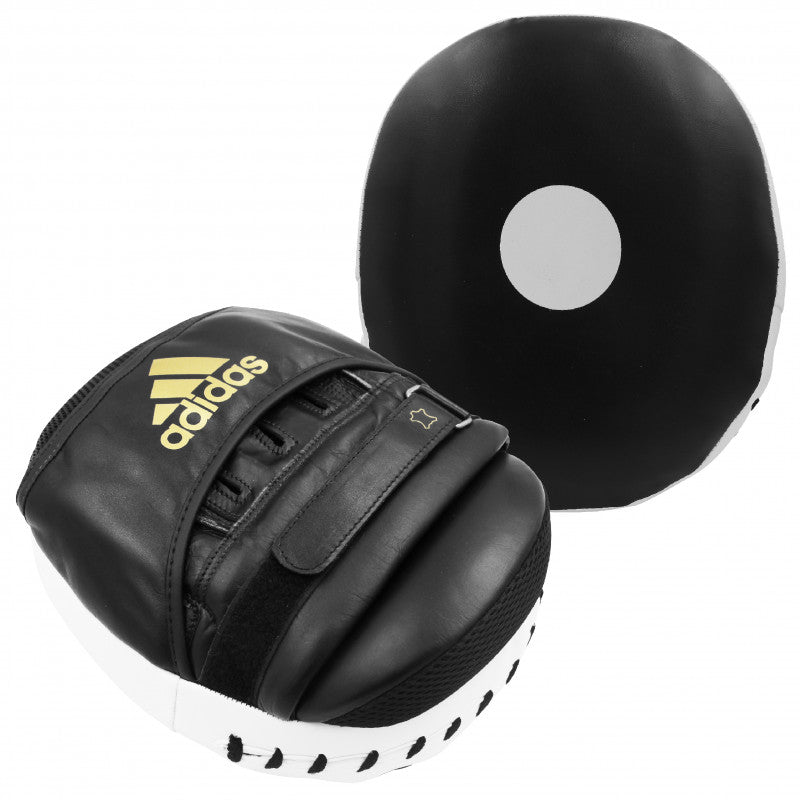 Black and white boxing glove designed for training.