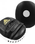 Black and white boxing glove designed for training.