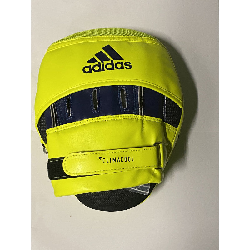 Yellow and black hat resembling Adidas punch mitt for boxing training.