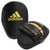 Black and gold boxing mitt.