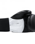 Black and white Adidas women's boxing glove.