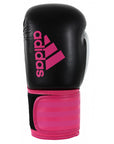 Black and pink adidas women's boxing glove from Hybrid 100 series.