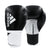 Pair of adidas Hybrid 100 women's boxing gloves in black and white.