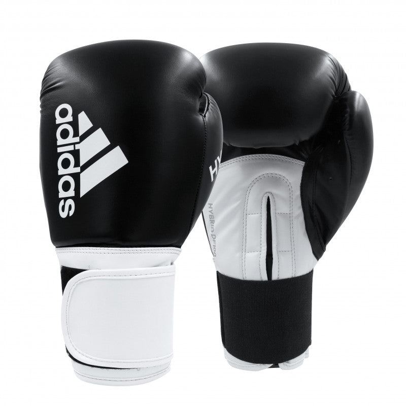 Pair of adidas Hybrid 100 women&#39;s boxing gloves in black and white.