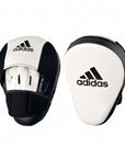 Pair of Adidas Hybrid 150 focus mitts in white and black for boxing training.