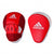 Pair of Adidas Hybrid 150 focus mitts in red and white for boxing training.