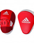 Pair of Adidas Hybrid 150 focus mitts in red and white for boxing training.