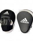 Pair of Adidas Hybrid 150 focus mitts in black and white for boxing training.