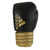 Black and gold boxing glove, adidas Hybrid 200.