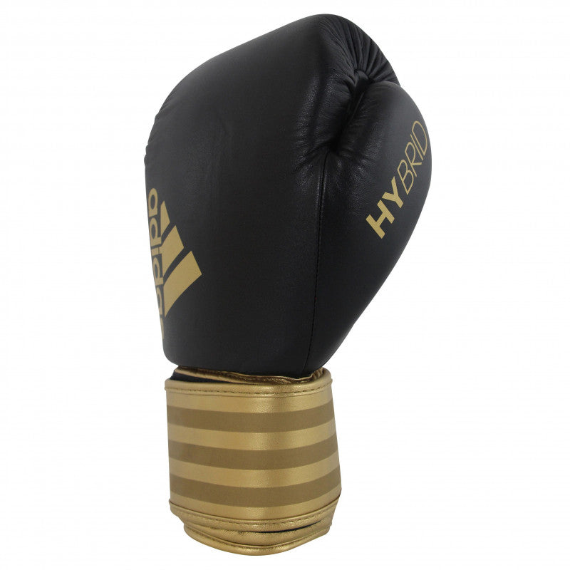 Black and gold boxing glove, adidas Hybrid 200.