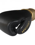 Black Adidas boxing glove with gold text, Hybrid 200.