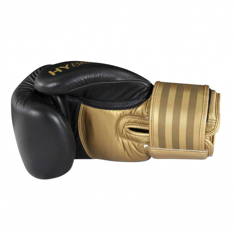 Black and gold Adidas Hybrid 200 leather boxing glove.