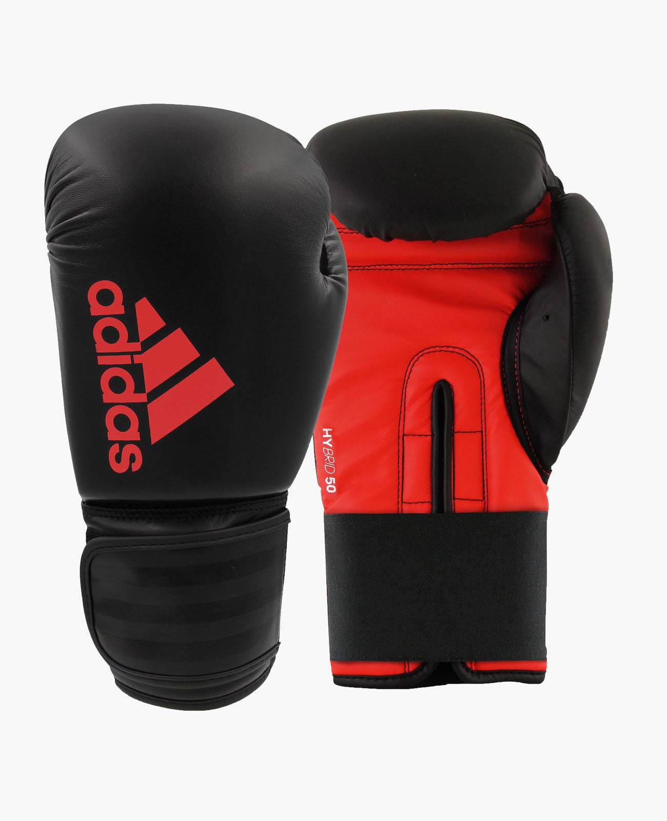 Pair of adidas Hybrid 50 boxing gloves, black and white.