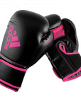 Pair of black and pink Adidas Hybrid 80 boxing gloves, 6 oz.