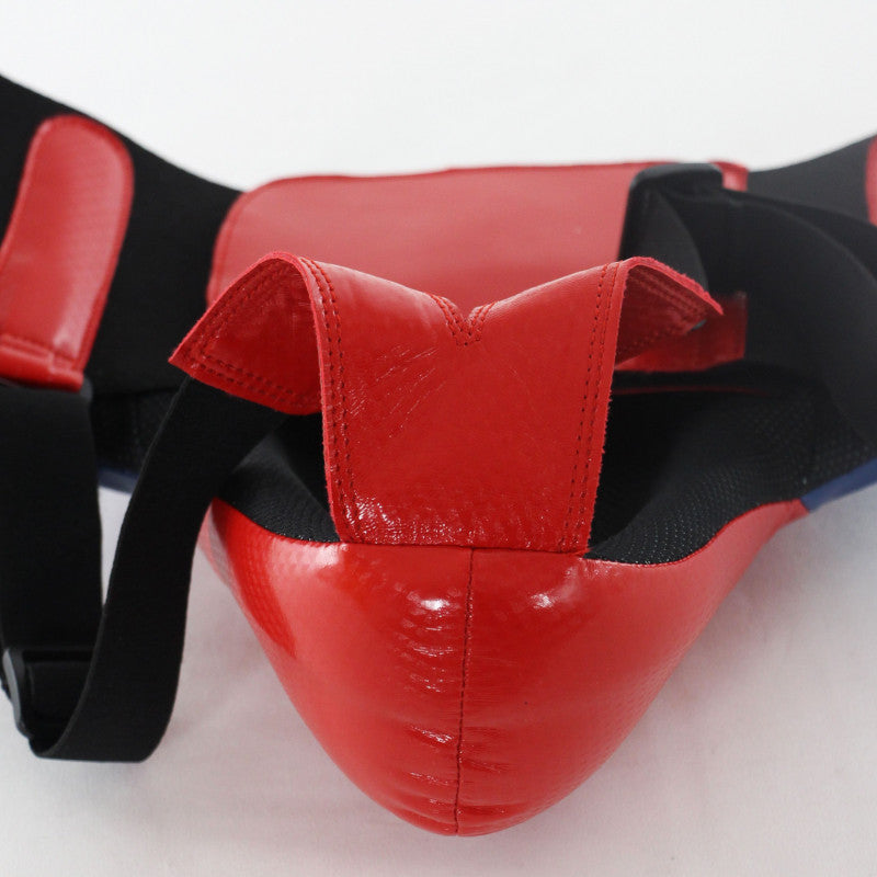 Red and black Adidas boxing groin protector.