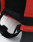 Close up of a red and black Adidas boxing groin guard.