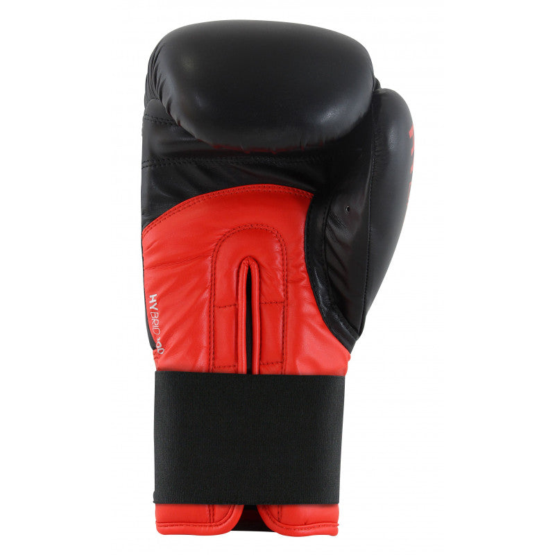 Red and black adidas Hybrid 100 boxing glove.