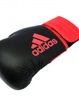 Black and red adidas Hybrid 100 boxing glove.