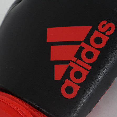 Black and red boxing glove from adidas Hybrid 100 series.