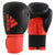 Pair of adidas Hybrid 100 boxing gloves for men and women.