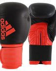 Pair of adidas Hybrid 100 boxing gloves for men and women.