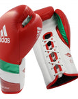 Pair of red and white boxing gloves, 16 oz weight.