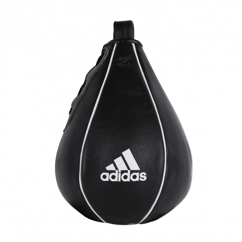 Black punching bag with white stitching by Adidas.