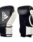 Pair of black and white adidas Hybrid 150 training gloves, 10 oz.