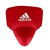 Red boxing pad with white Adidas logo for protection.