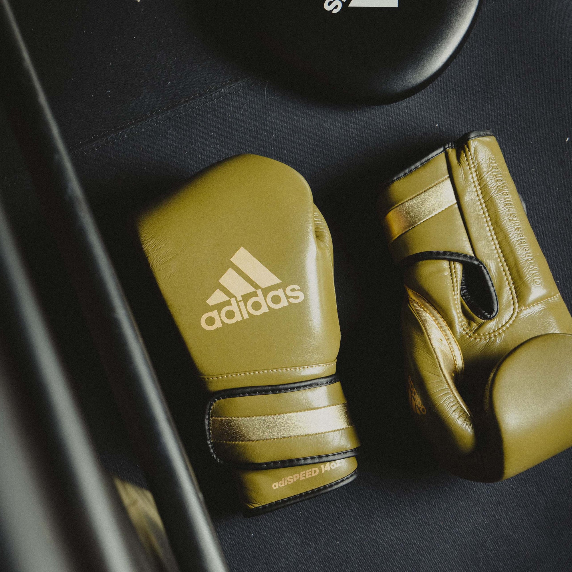 Pair of limited edition adiSPEED 501 boxing gloves.