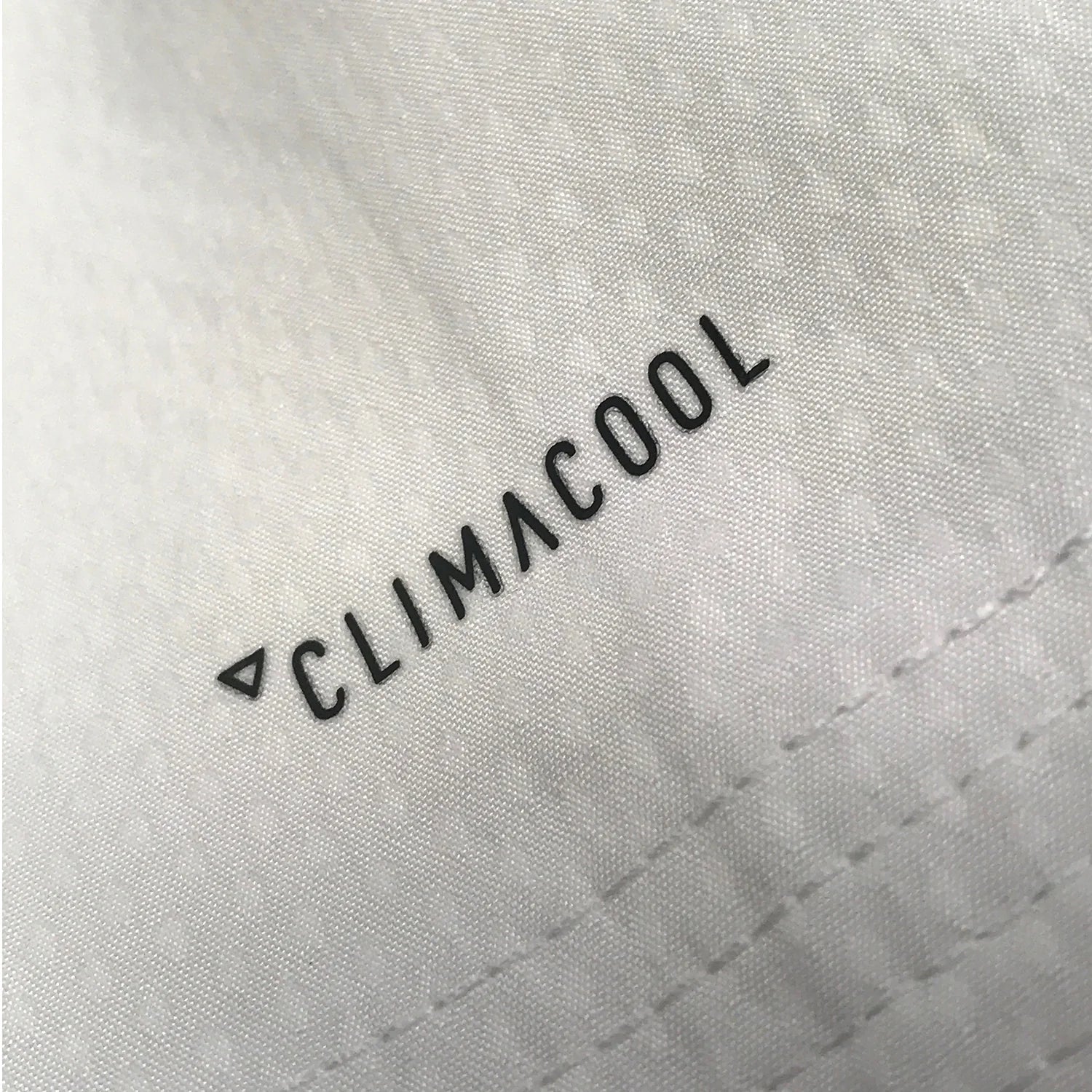 Close up of fabric material from adidas Taekwondo Eco Fighter Uniform.