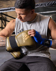 Man wearing limited edition adiSPEED 501 boxing gloves.