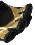 Close-up of GRAPPLING 350 boxing glove in white, gold, black, size S.