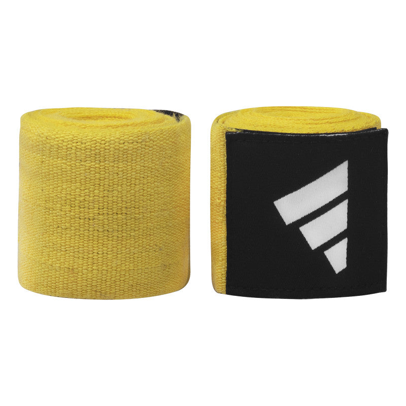 Pair of yellow and black bandages for boxing protective gear.