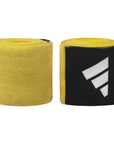 Pair of yellow and black bandages for boxing protective gear.