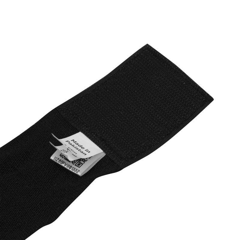 Black boxing hand wrap fabric with white label, protective equipment.